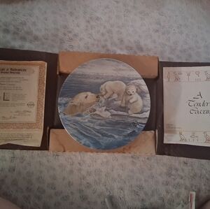 A Tender Coaxing Collectable Decorative Plate